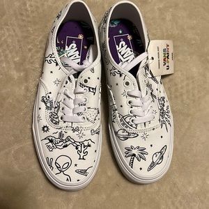 Size 8. Women’s Vans. Black & White. Authentic style.